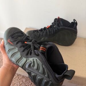 Nike Black and Orange Foamposite Sneakers